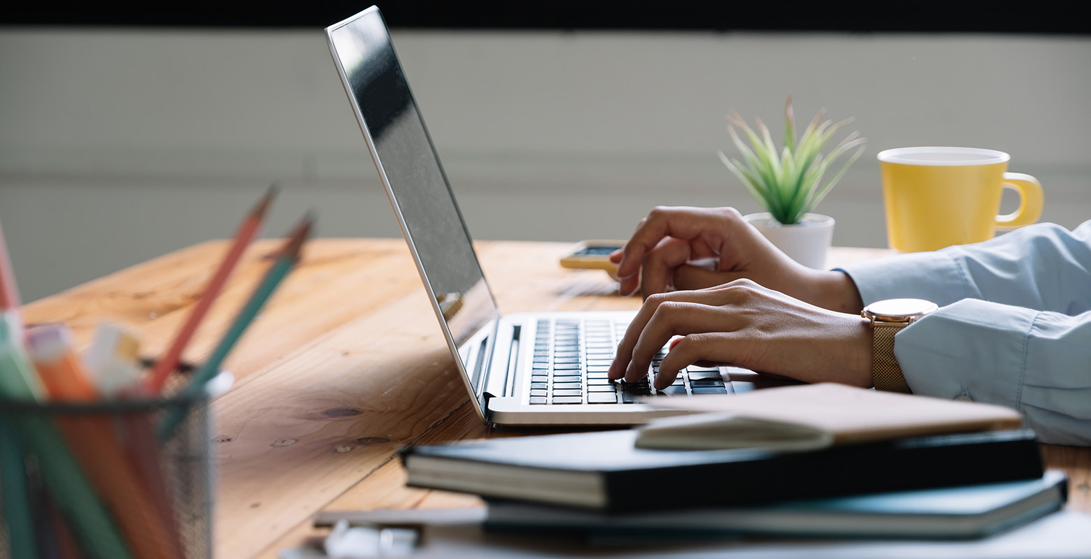 Close Up Hand On Laptop